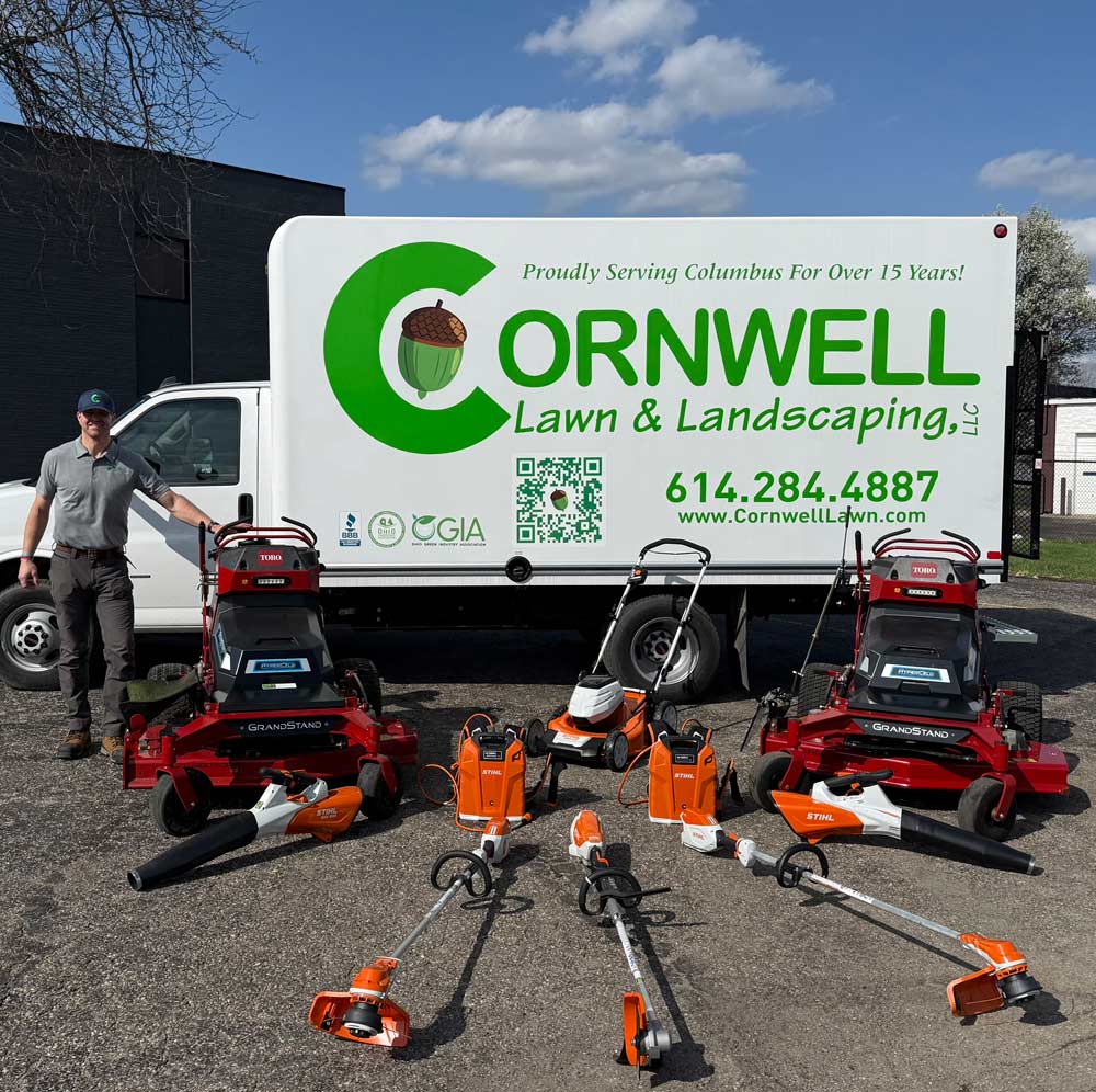 Cornwell truck with tools on the ground